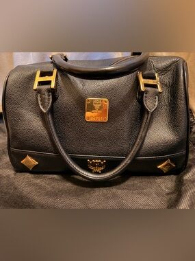 Authentic MCM Black Pebbled Leather Boston Bag with Gold Hardware